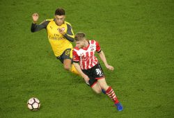 Alex Oxlade-chamberlain of Arsenal and Josh Sims of Southampton During the the Fa Cup 4th Round Match Between Southampton and Arsenal at St Mary's Stadium Southampton England On 28 January 2017