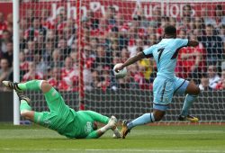 Burnley's Andre Gray scores past Nottingham Forest's Jordan Smith but the goal is disallowed