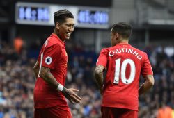 epa05910954 Liverpool's Roberto Firmino celebrates with teammate Philippe Coutinho (R) after scoring the 1-0 lead during the English Premier League match between West Bromwich Albion and Liverpool FC at The Hawthorns in West Bromwich, Britain, 16 April 2017.  EPA/WILL OLIVER EDITORIAL USE ONLY. No use with unauthorized audio, video, data, fixture lists, club/league logos or 'live' services. Online in-match use limited to 75 images, no video emulation. No use in betting, games or single club/league/player publications.
