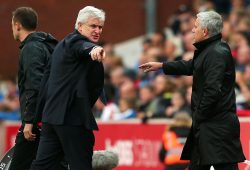 Stoke City manager Mark Hughes argues with Manchester United manager Jose Mourinho in the technical area