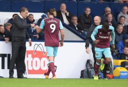West Ham United Manager Slaven Bilic bumps fists with Andy Carroll