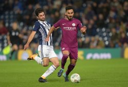 Claudio Yacob of West Bromwich Albion  tackles Ilkay Gundogan of Manchester City