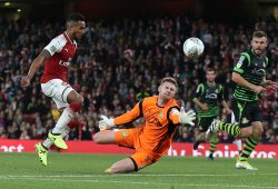 Theo Walcott of Arsenal scores the opening goal