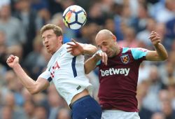 Jan Vertonghen  of Tottenham Hotspur battles with  Pablo Zabaleta  of West Ham United