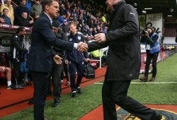 Crystal Palace manager Frank de Boer and Burnley manager Sean Dyche shake hands before the game