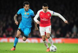 Football - 2015 / 2016 Champions League - Round of 16 First Leg: Arsenal vs Barcelona Alexis Sanchez of Arsenal and Dani Alves of Barcelona at The Emirates