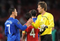 Manchester United Goalkeeper Edwin Van Der Sar Shakes Hands with Cristiano Ronaldo at Full Time United Kingdom London