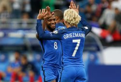 Thomas Lemar of France celebrates scoring his sides third goal with team mate Antoine Griezmann of France.