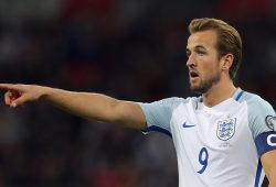 Harry Kane of England points the way to his team mates