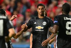 Marcus Rashford of Manchester United is  congratulated by team mates.