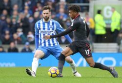Arsenal forward Alex Iwobi (17) battles with Brighton and Hove Albion midfielder Davy Propper (24) during the Premier League match between Brighton and Hove Albion and Arsenal at the American Express Community Stadium, Brighton and Hove. Picture by Phil Duncan