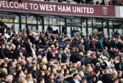 West Ham fans gather and protest in front of the directors box while Karen Brady looks on (centre back row)