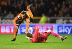 Barry Douglas of Wolverhampton Wanderers collides with Goalkeeper Anssi Jaakkola of Reading