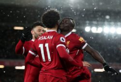 Mohamed Salah celebrates scoring his third hat trick goal to make the score 4-0 with Alex Oxlade-Chamberlain and Sadio Mane