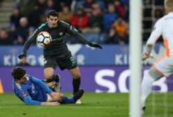 Harry Maguire of Leicester City tackles Alvaro Morata of Chelsea