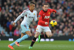 epa03998147 Manchester United's Wayne Rooney (R) in action with West Ham united's Ravel Morrison (L) during the English Premier League soccer match at Old Trafford, Manchester, Britain, 21 December 2013.  EPA/PETER POWELL https://www.epa.eu/downloads/DataCo-TCs.pdf