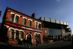 A general view of Anfield Stadium, home of Liverpool football club with The Albert Pub near the entrance for the Kop end