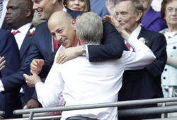 Ivan Gazidis the Arsenal Chief Executive hugs manager Arsene Wenger after the game