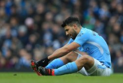 Sergio Aguero of Manchester City clears his football boots