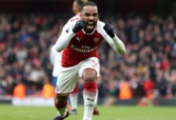 Alexandre Lacazette of Arsenal celebrates scoring the third goal from a penalty