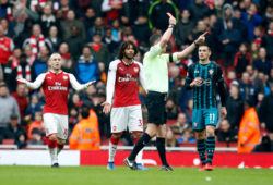 Mohamed Elneny of Arsenal is shown a red card by referee Andre Marriner