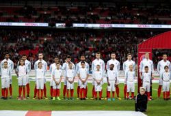 The England team lines up with their player's mascots to sing he national anthems