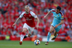 Jack Wilshere of Arsenal gets away from Jack Cork of Burnley