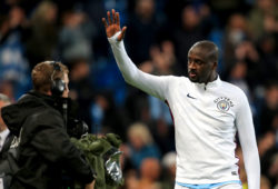 Yaya Toure of Manchester City waves to the fans as he leaves the Etihad Stadium pitch for the final time