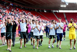 Manchester City players celebrate with the fans.