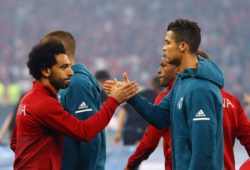 Mohamed Salah of Liverpool and Cristiano Ronaldo of Real Madrid shake hands before kick-off