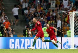 Cristiano Ronaldo of Portugal celebrates his equalising goal scored from a free kick 3-3