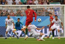 4.07630379 5558369 25.06.2018 Portugal's Cristiano Ronaldo hits a ball during the World Cup Group B soccer match between Iran and Portugal at the Mordovia Arena, in Saransk, Russia, June 25, 2018. Mikhail Voskresenskiy / Sputnik 
IBL