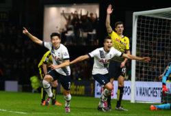 Son Heung-Min of Tottenham Hotspur celebrates scoring his goal to make the score 1-2 with Erik Lamela during the Barclays Premier League match between Watford and Tottenham Hotspur played at Vicarage Road, London on 28th December 2015