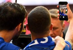 Eden Hazard of Chelsea takes a selfie with Cesc Fabregas