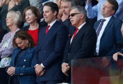 Stan Kroenke (in sun glasses) the Arsenal majority shareholder with his son Josh Kroenke next to him