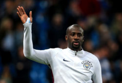 Yaya Toure of Manchester City waves to the fans as he leaves the Etihad Stadium pitch for the final time