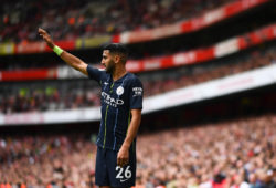 Riyad Mahrez of Manchester City signals for a corner before bing substituted