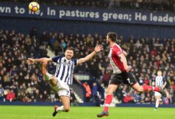 West Bromwich Albion defender Gareth McAuley (23) clears in front of Southampton striker Shane Long (7) during the Premier League match between West Bromwich Albion and Southampton at The Hawthorns, West Bromwich. Picture by Dennis Goodwin