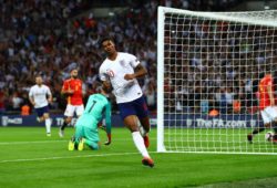 Marcus Rashford of England celebrates scoring a goal to make the score 1-0