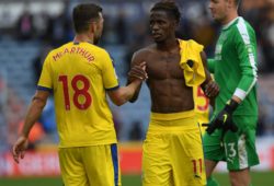 Wilfried Zaha of Crystal Palace celebrates with James McArthur at full time