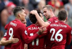 Mohamed Salah celebrates scoring his sides third goal with Roberto Firmino, Xherdan Shaqiri, Andy Robertson, Jordan Henderson