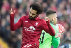 Liverpool forward Mohamed Salah left reacts after a missed opportunity to score past Manchester City goalkeeper Ederson right