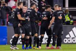 D.C. United forward Wayne Rooney (9) celebrates with teammates after scoring during the MLS game between D.C. United and Toronto FC at Audi Field in Washington, District of Columbia