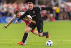 Wayne Rooney, Antonio Mlinar Delamea
Washington, DC - August 19, 2018: D.C. United defeated the New England Revolution 2-0 during a Major League Soccer (MLS) match at Audi Field.