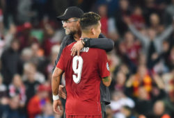 Jurgen Klopp hugs Roberto Firmino on the final whistle