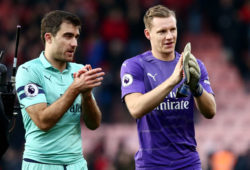 Sokratis Papastathopoulos and Bernd Leno of Arsenal applaud the fans.