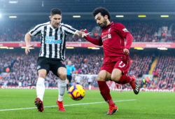 Mohamed Salah of Liverpool takes on Federico Fernandez of Newcastle United