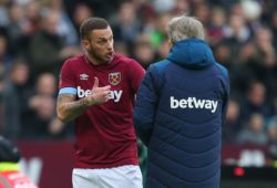 Marko Arnautovic of West Ham United argues with Manuel Pellegrini manager of West Ham United after being substituted
