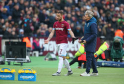 Marko Arnautovic of West Ham United argues with Manuel Pellegrini manager of West Ham United after being substituted