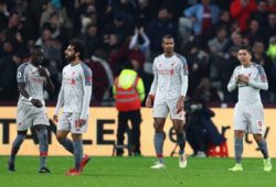 Liverpool players look dejected after Michail Antonio of West Ham United scores a goal to make the score 1-1